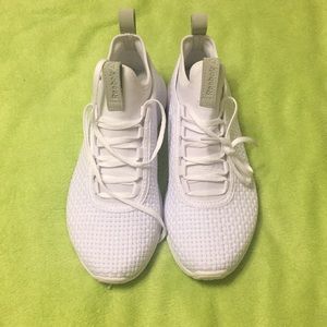 Pure white Reebok tennis shoes